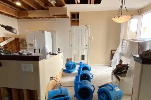 Air movers drying a room after a leak in Forest Park, GA