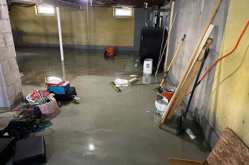 Flooded basement being cleaned in a Forest Park, GA home